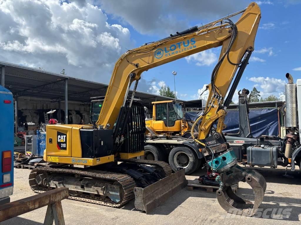 CAT 310 حفارات زحافة