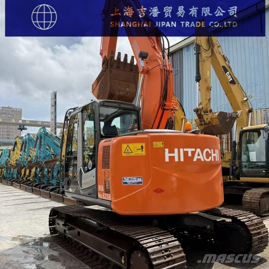Hitachi ZX 135 حفارات زحافة