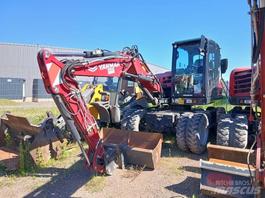 Yanmar B 75 W حفارات بعجل