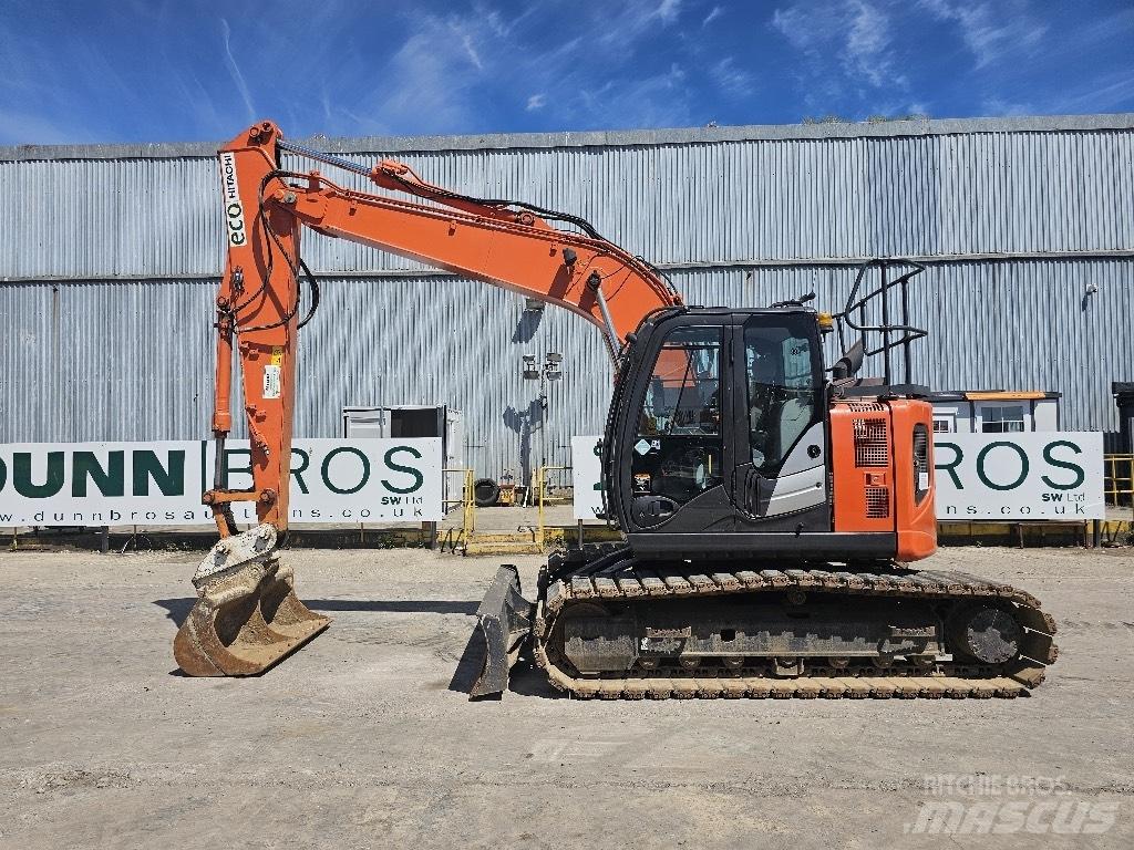 Hitachi ZX 135 US-6 حفارات زحافة