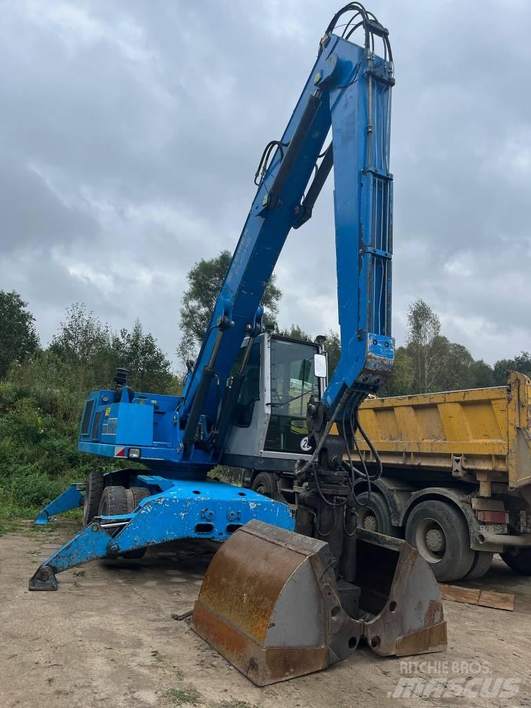 Fuchs MHL 320 حفارات بعجل