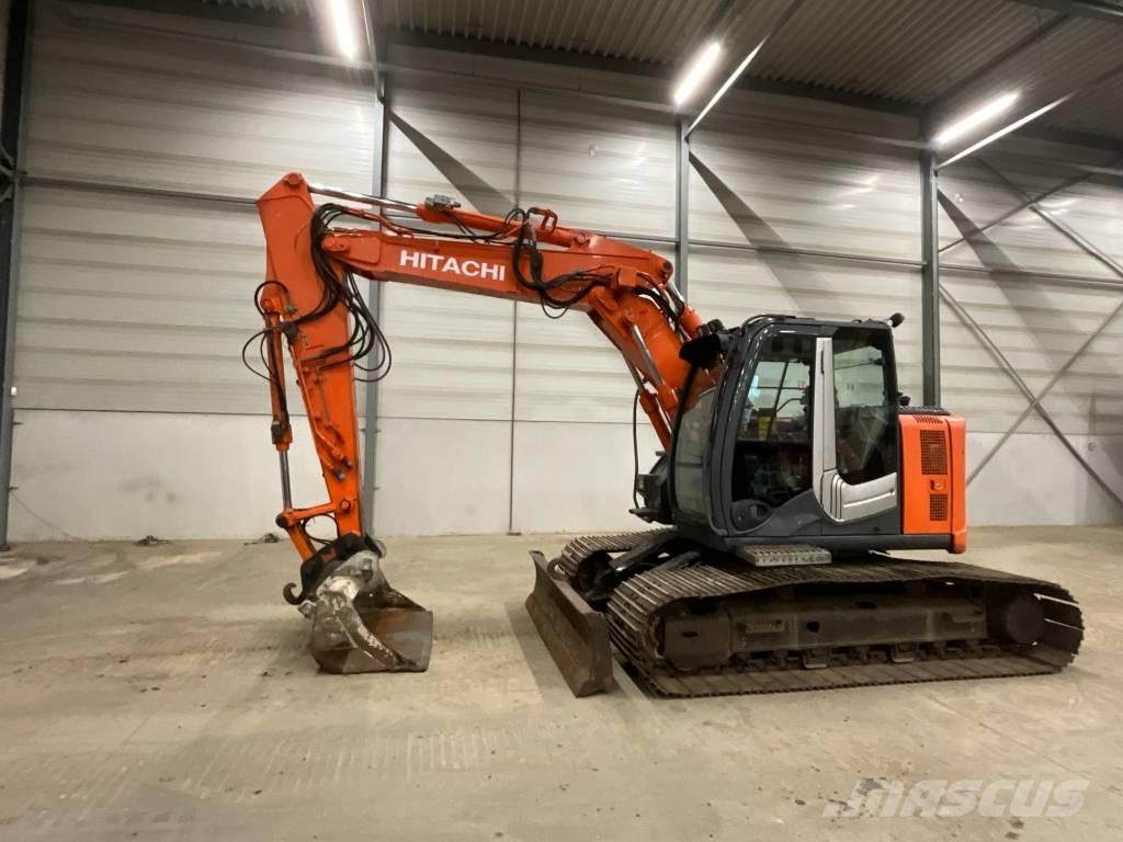 Hitachi ZX 135 US-3 حفارات زحافة