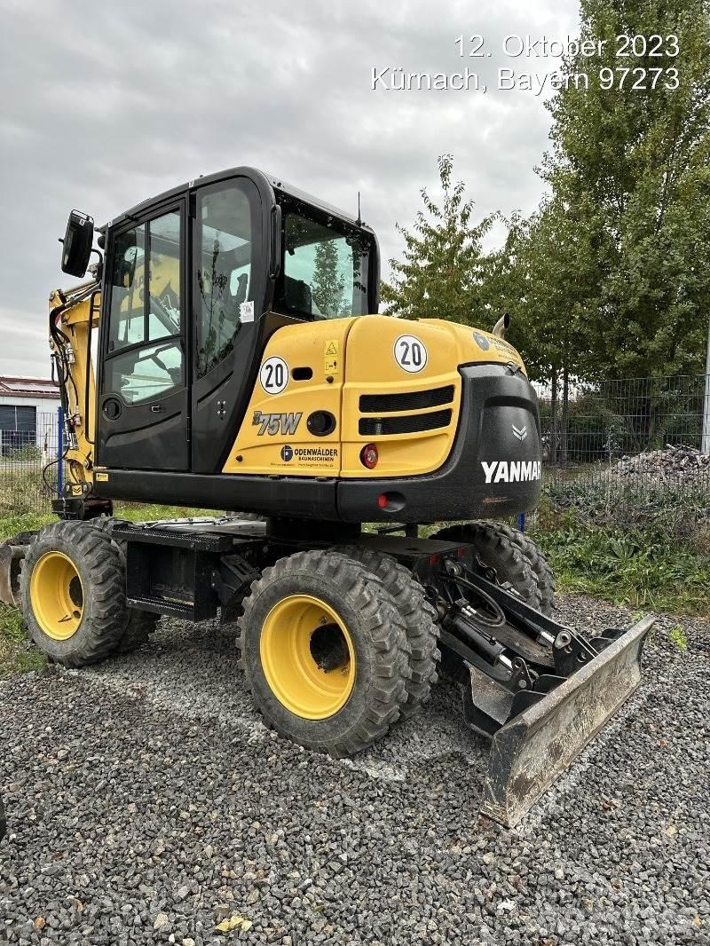 Yanmar B75W حفارات بعجل