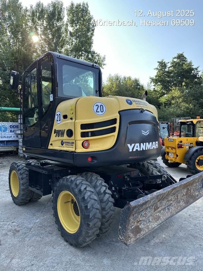 Yanmar B75W حفارات بعجل