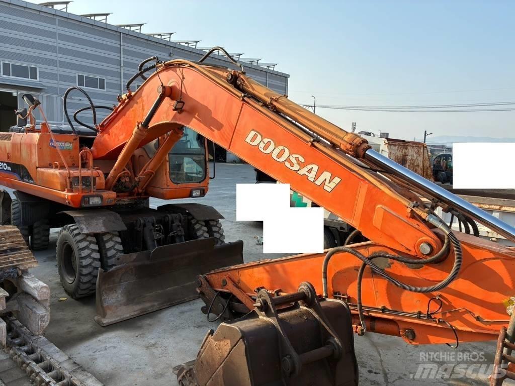 Daewoo Solar 210 W V حفارات بعجل