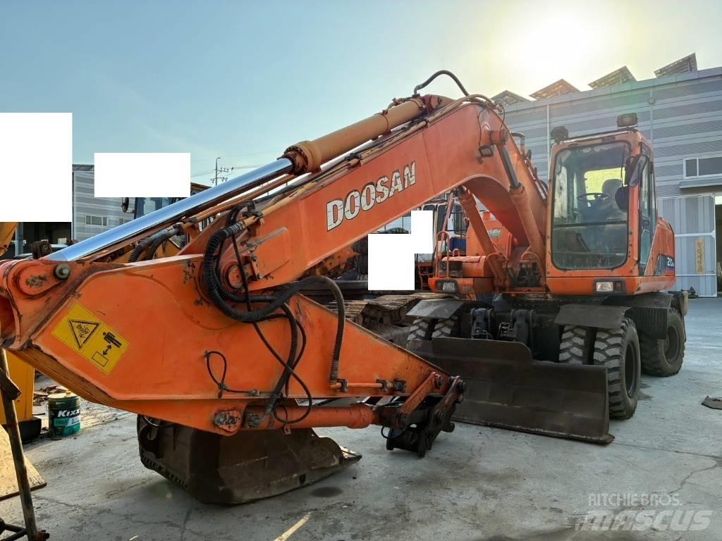Daewoo Solar 210 W V حفارات بعجل