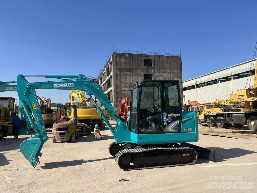 Kobelco sk60 حفارات زحافة