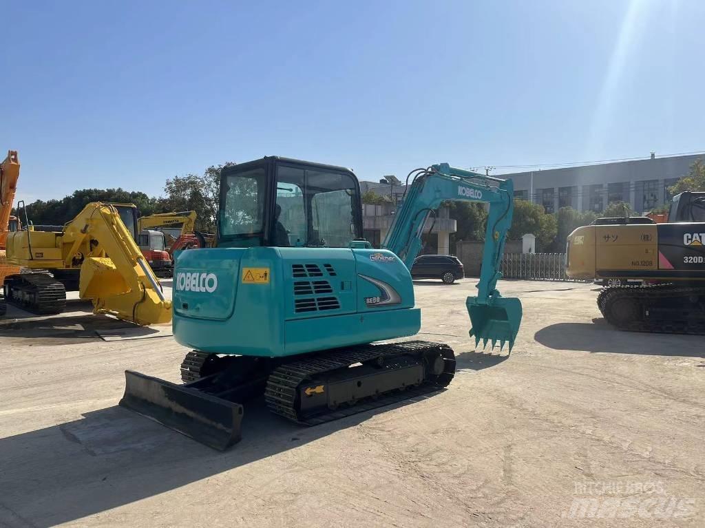 Kobelco sk60 حفارات زحافة