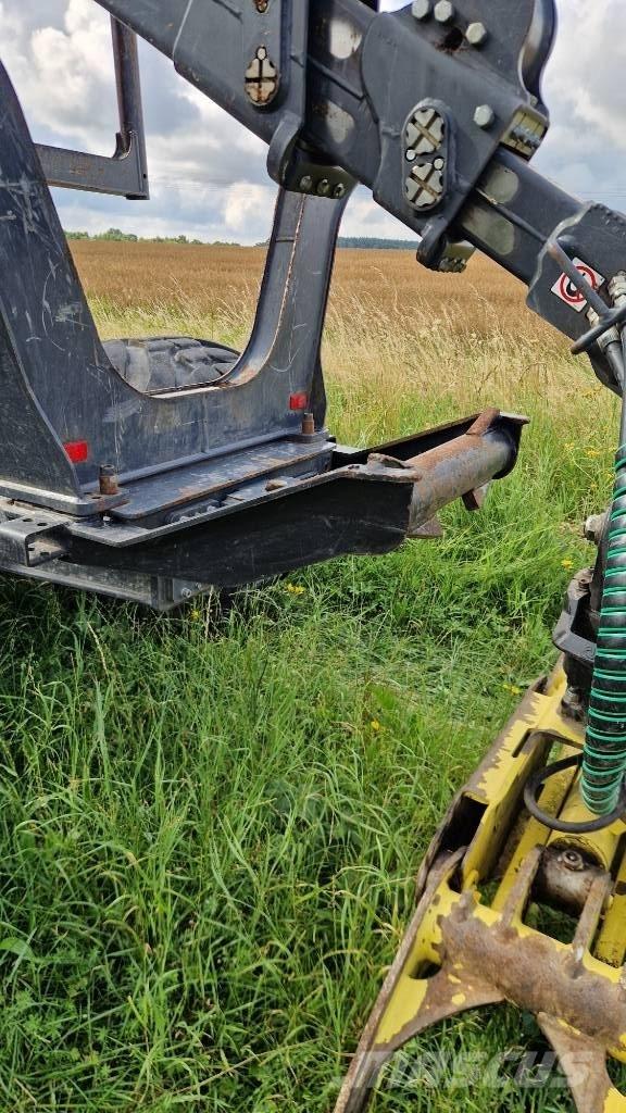 John Deere 1010G شاحنات