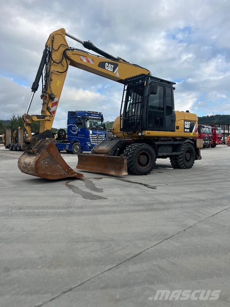 CAT M 316 D حفارات بعجل