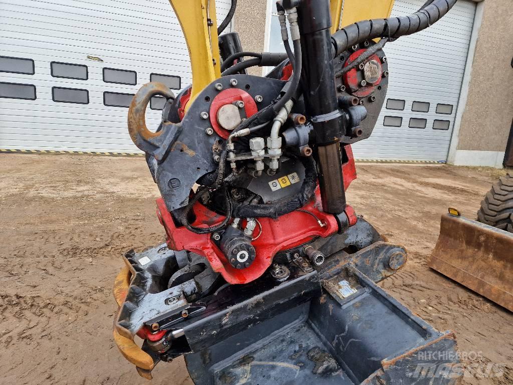 CAT M 315 F حفارات بعجل