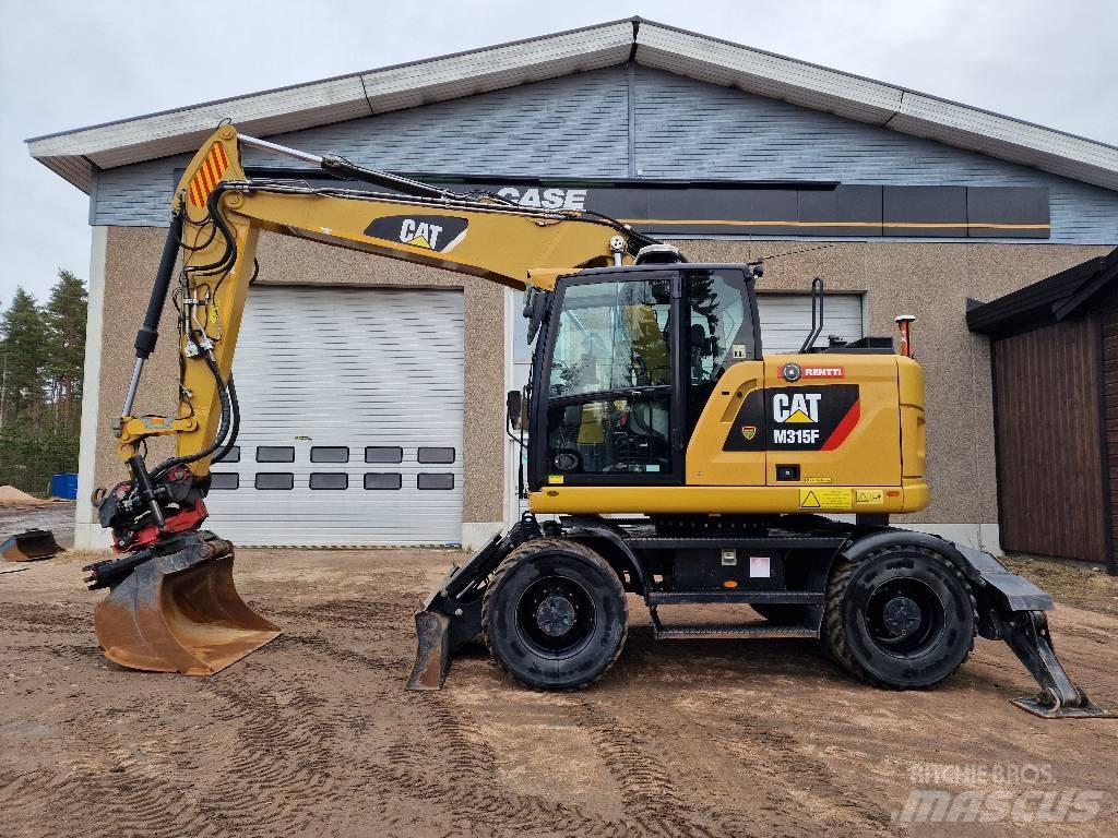 CAT M 315 F حفارات بعجل