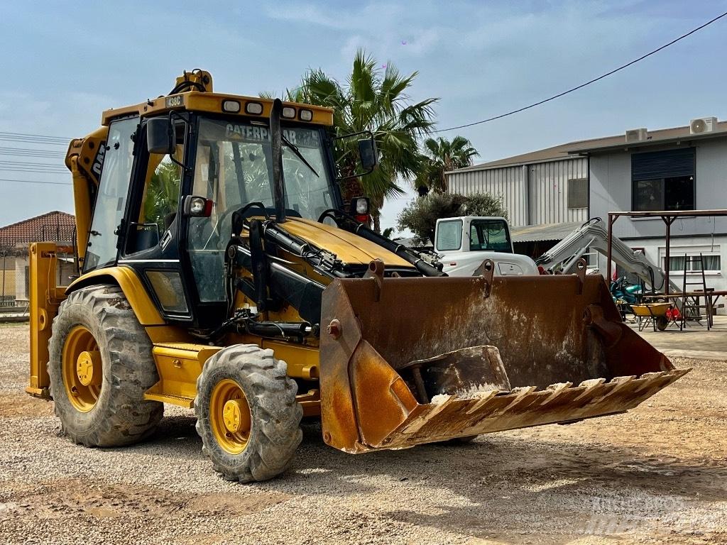 CAT 438 C لوادر ذات جرافات عكسية