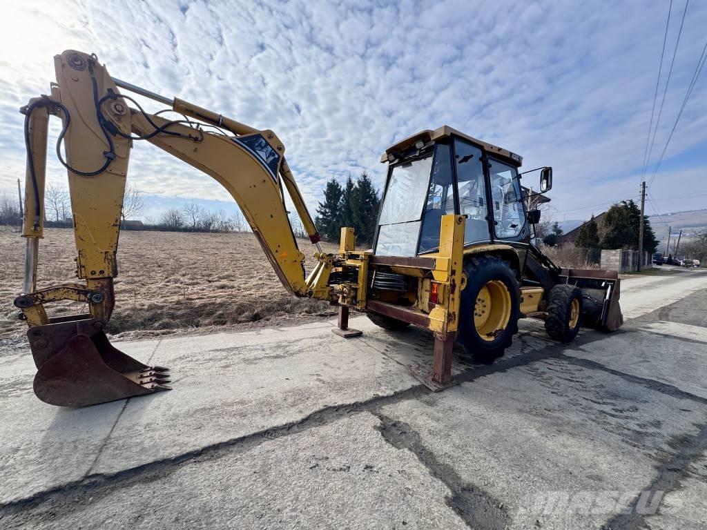 CAT 428 C لوادر ذات جرافات عكسية