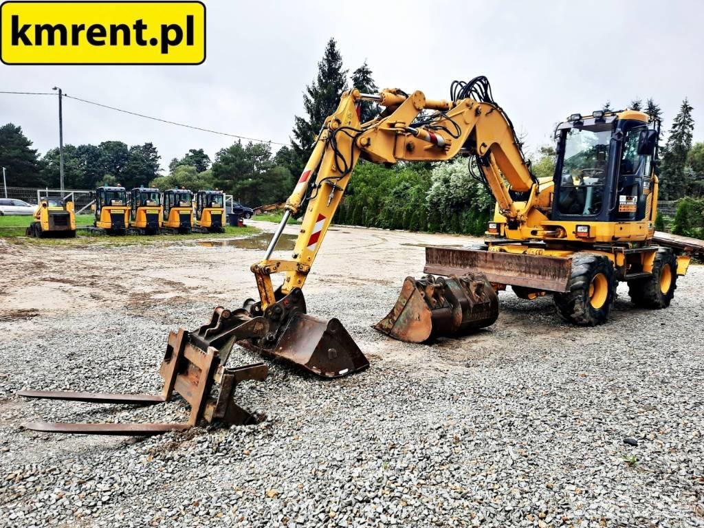 Komatsu PW 118 حفارات بعجل
