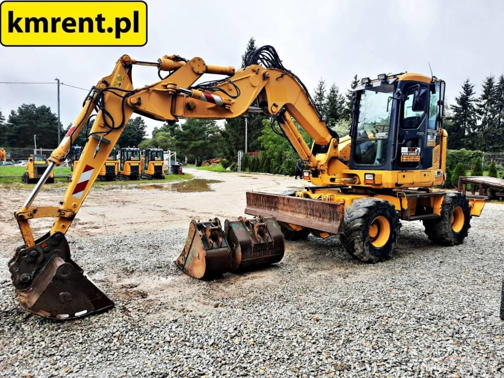 Komatsu PW 118 حفارات بعجل