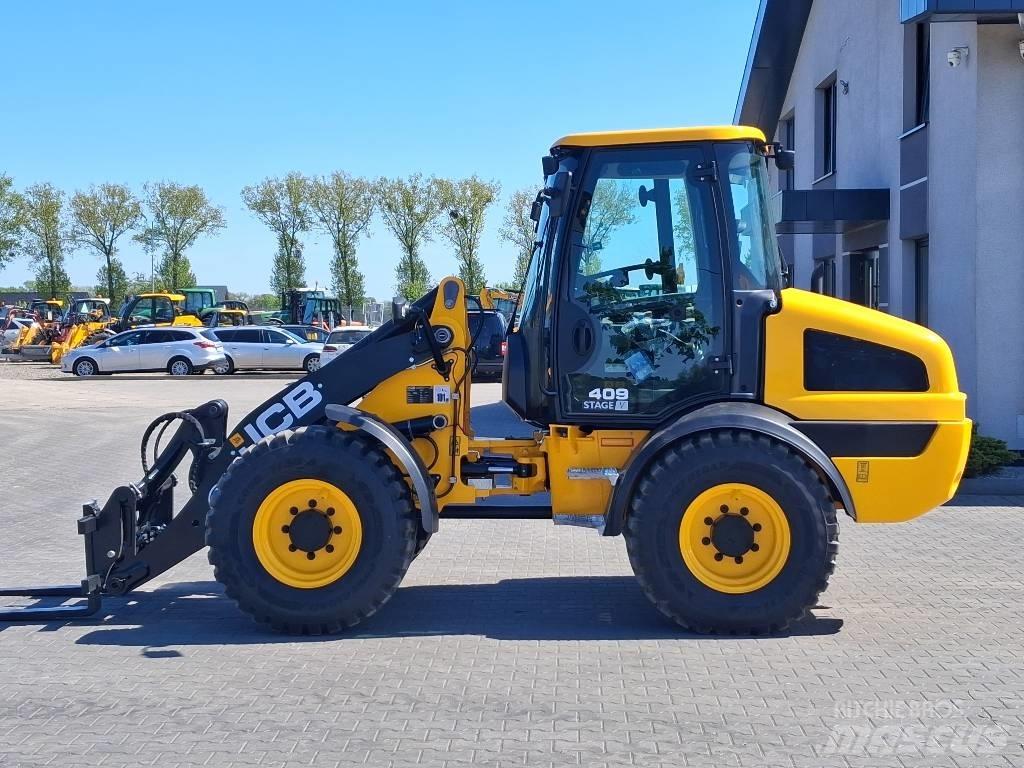 JCB 409 لوادر بعجل