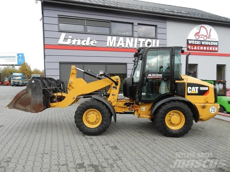 CAT 906M لوادر بعجل