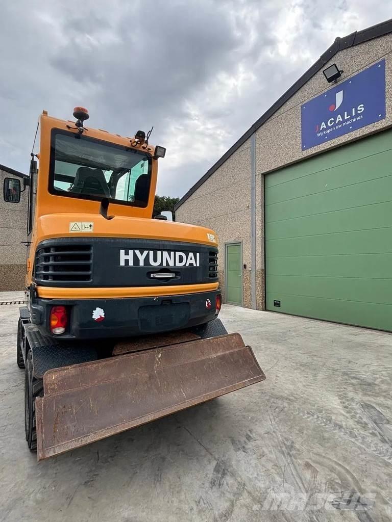 Hyundai R55W-9A حفارات بعجل