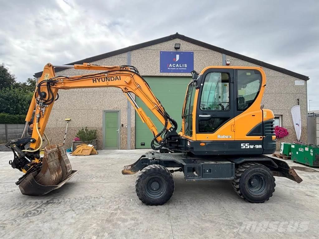 Hyundai R55W-9A حفارات بعجل