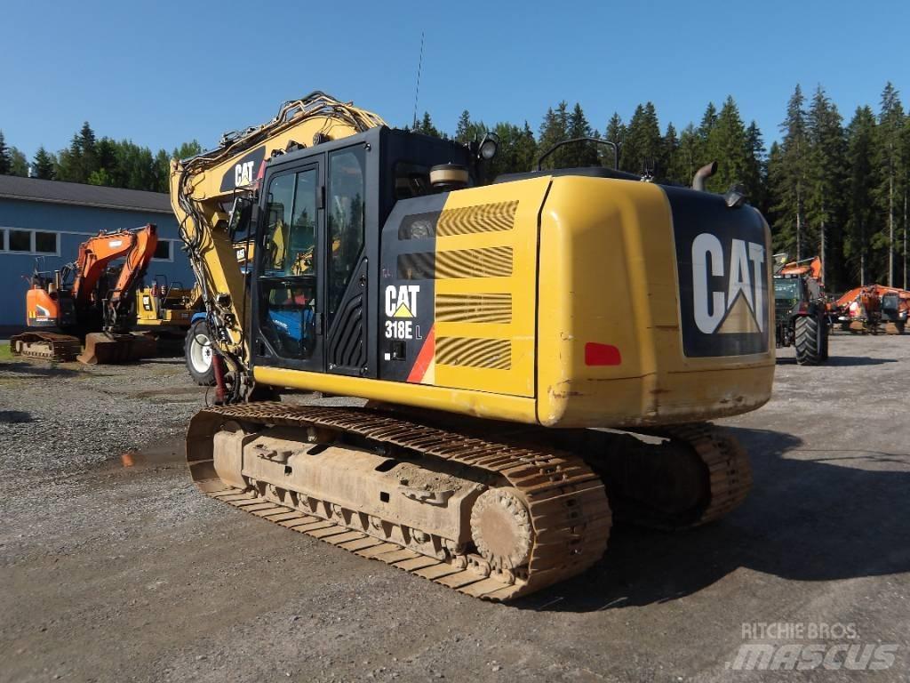 CAT 318 E L حفارات زحافة