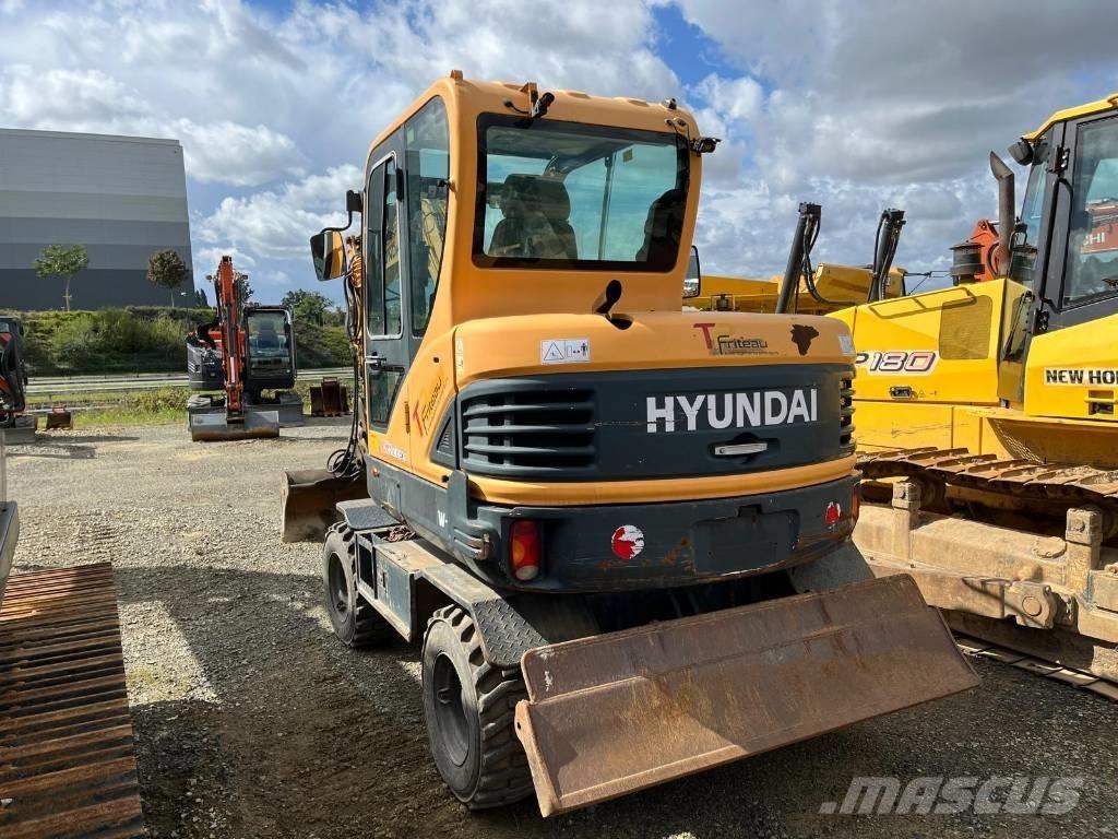 Hyundai R55W-9 حفارات بعجل