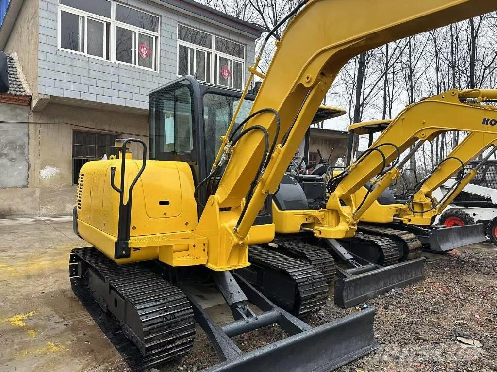 Komatsu PC56-7 حفارات زحافة