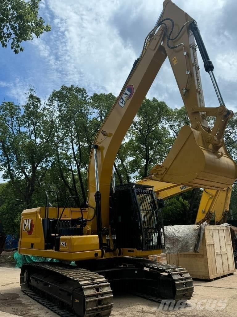 CAT 323 حفارات وسط 7 طن - 12 طن