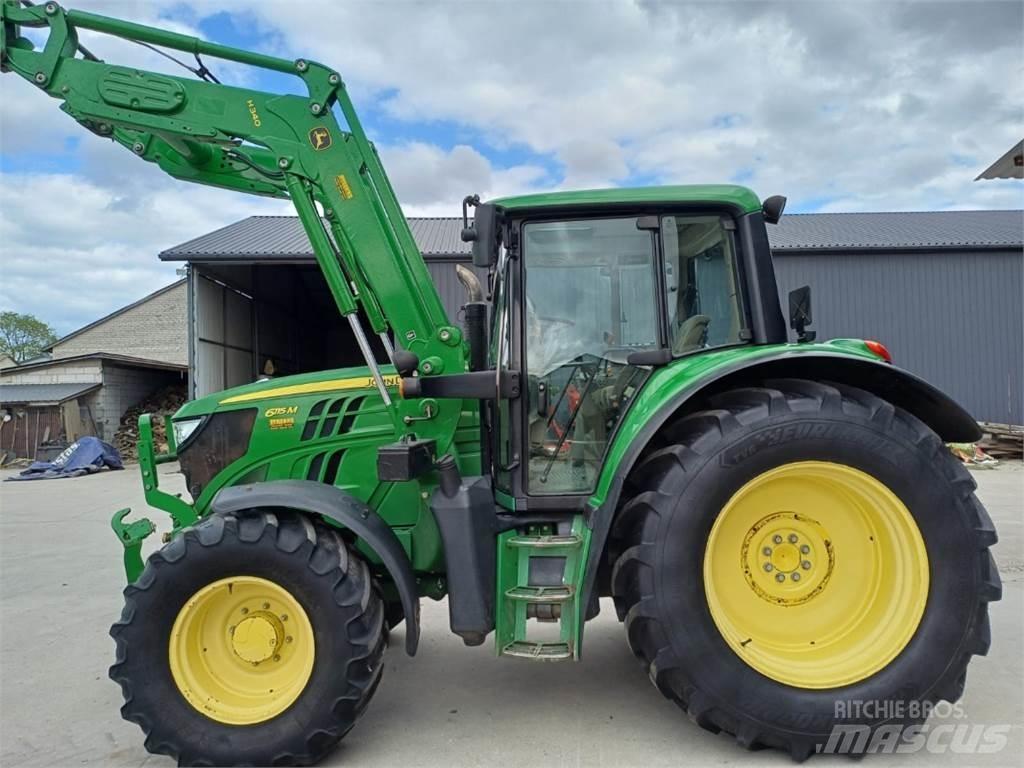 John Deere 6115 M الجرارات