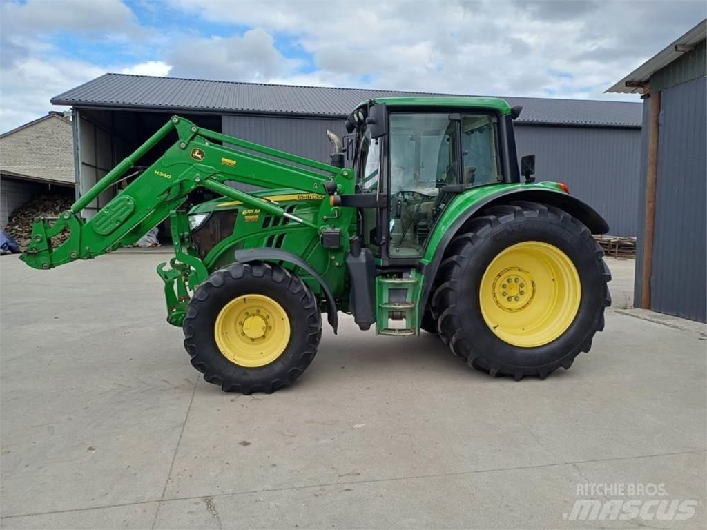 John Deere 6115 M الجرارات