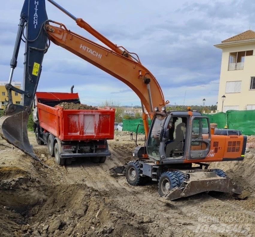 Hitachi ZX 210 W حفارات بعجل