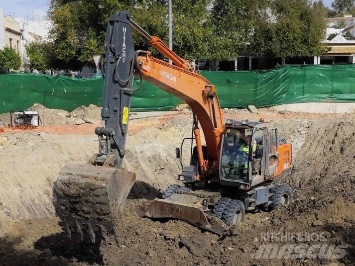 Hitachi ZX 210 W حفارات بعجل
