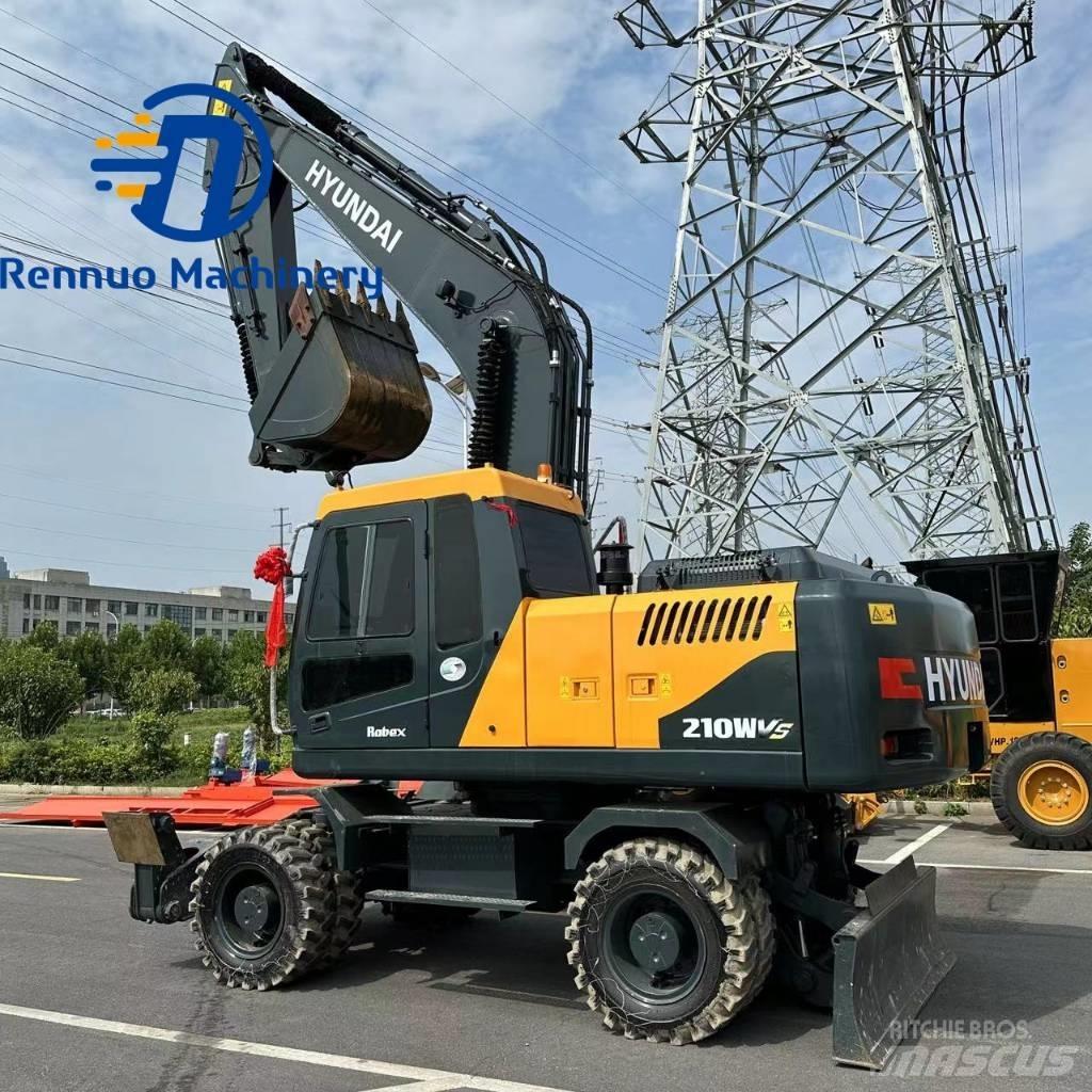 Hyundai R210W-9 حفارات بعجل