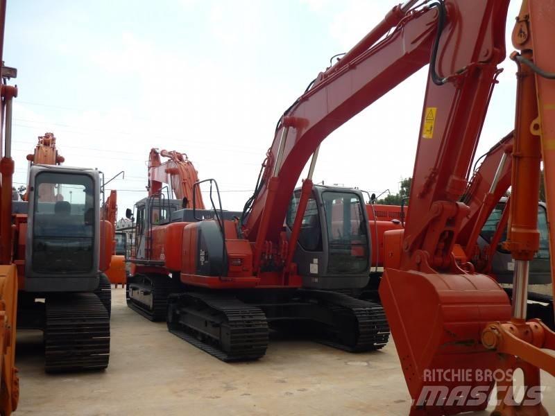 Hitachi ZX 225 US حفارات زحافة