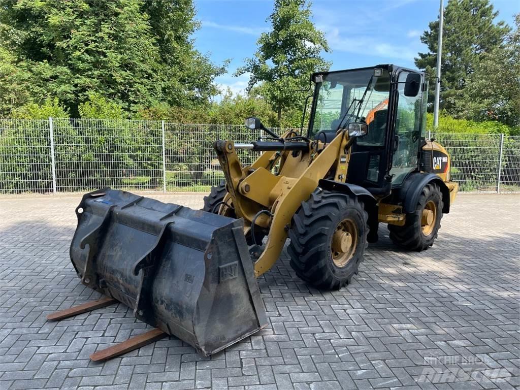 CAT 906H2 لوادر بعجل