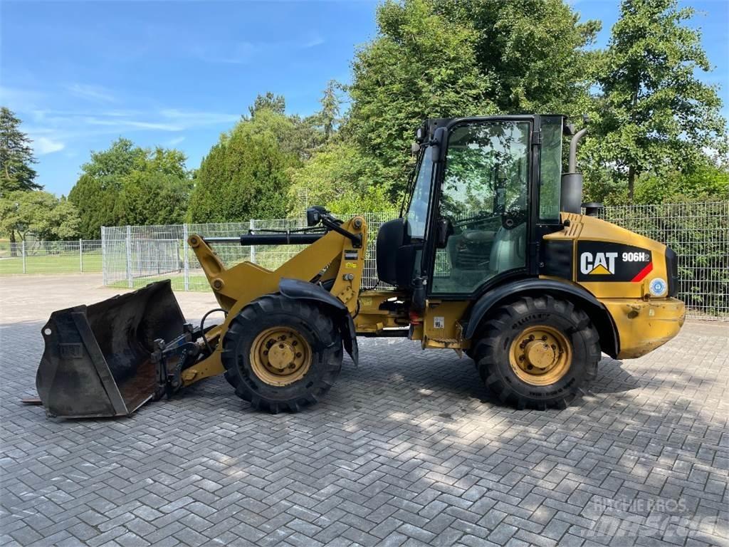 CAT 906H2 لوادر بعجل