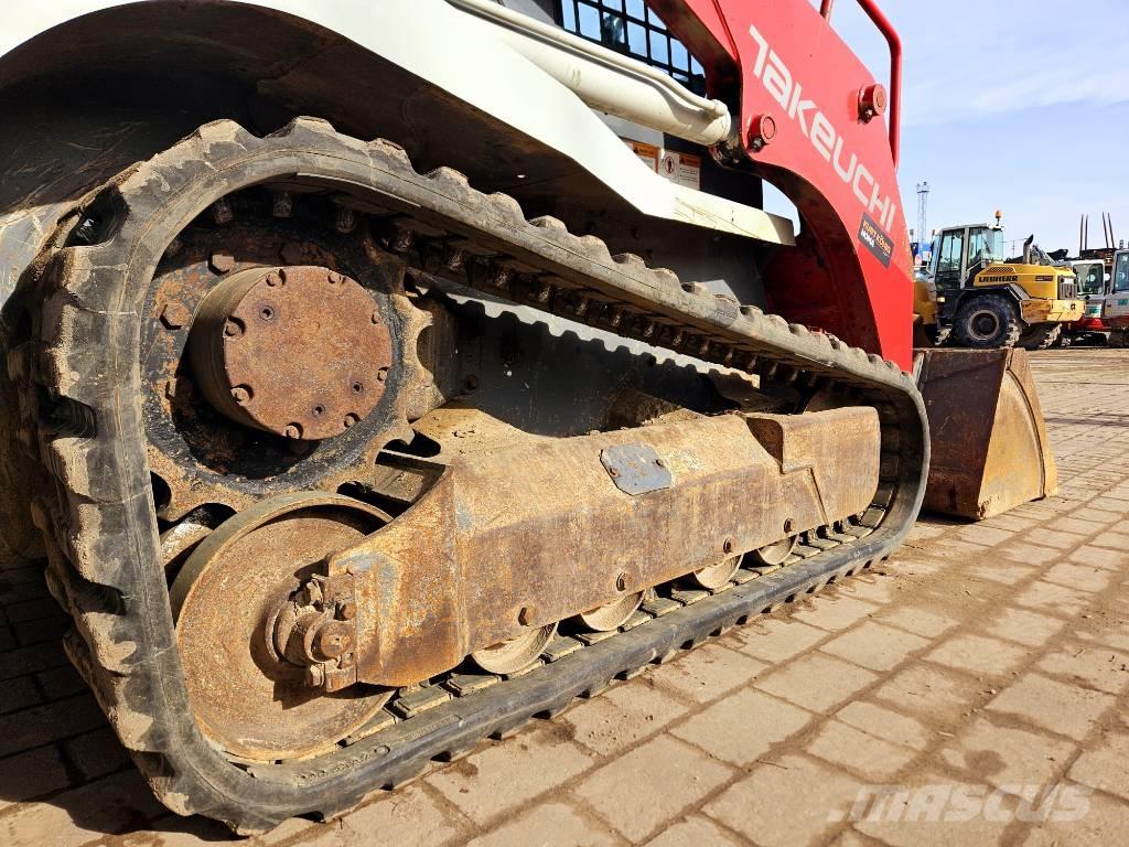 Takeuchi TL 8 لوادر انزلاقية التوجيه