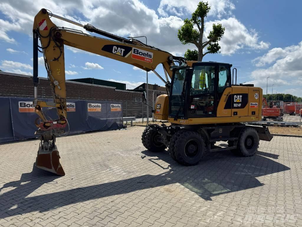 CAT M314F حفارات بعجل