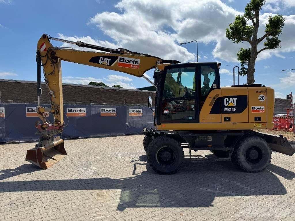 CAT M314F حفارات بعجل