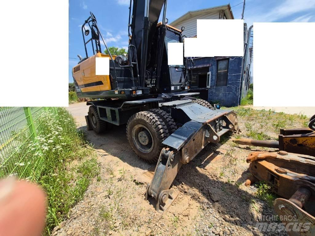 Hyundai HW 210 A حفارات بعجل