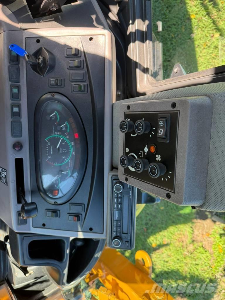 CASE 590 SM لوادر ذات جرافات عكسية