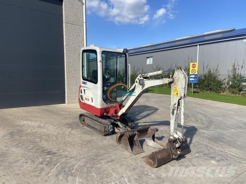 Takeuchi TB216 حفارات بعجل