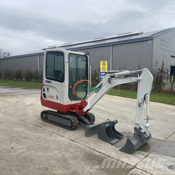 Takeuchi TB216 حفارات بعجل
