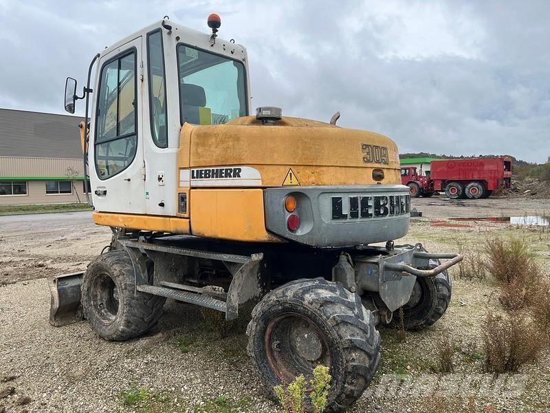 Liebherr A309 حفارات بعجل