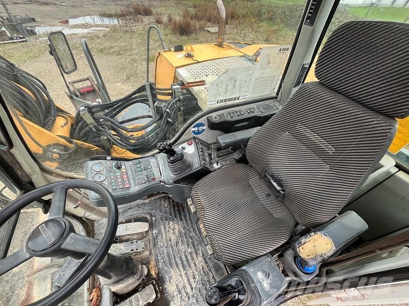 Liebherr A309 حفارات بعجل