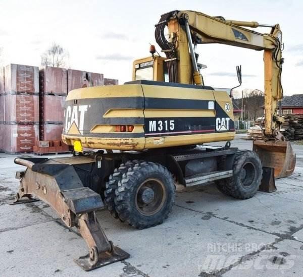 CAT M 315 حفارات بعجل