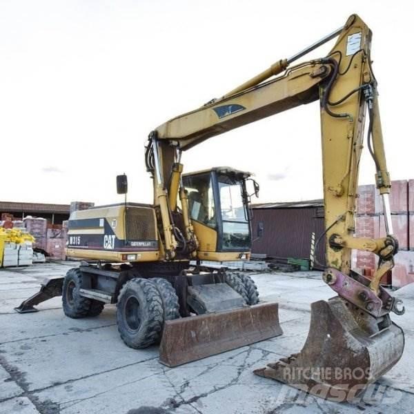 CAT M 315 حفارات بعجل