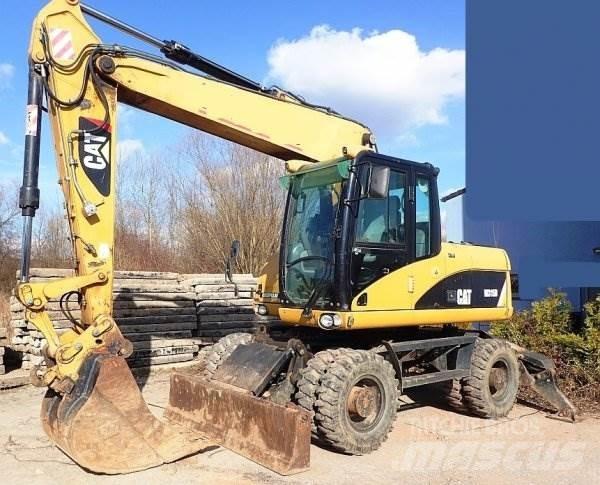 CAT M 315 D حفارات بعجل