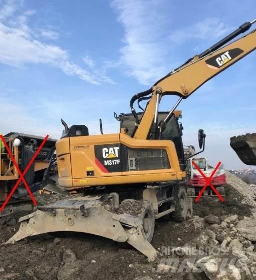 CAT M317 F حفارات بعجل