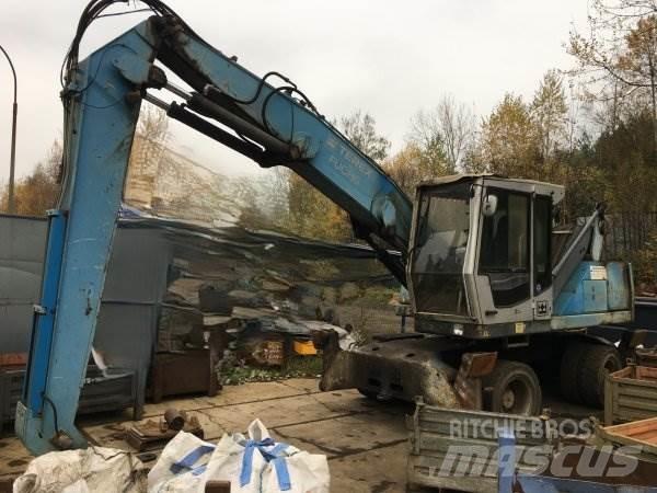 Fuchs MHL 320 مناولات المخلفات / مناولات صناعية
